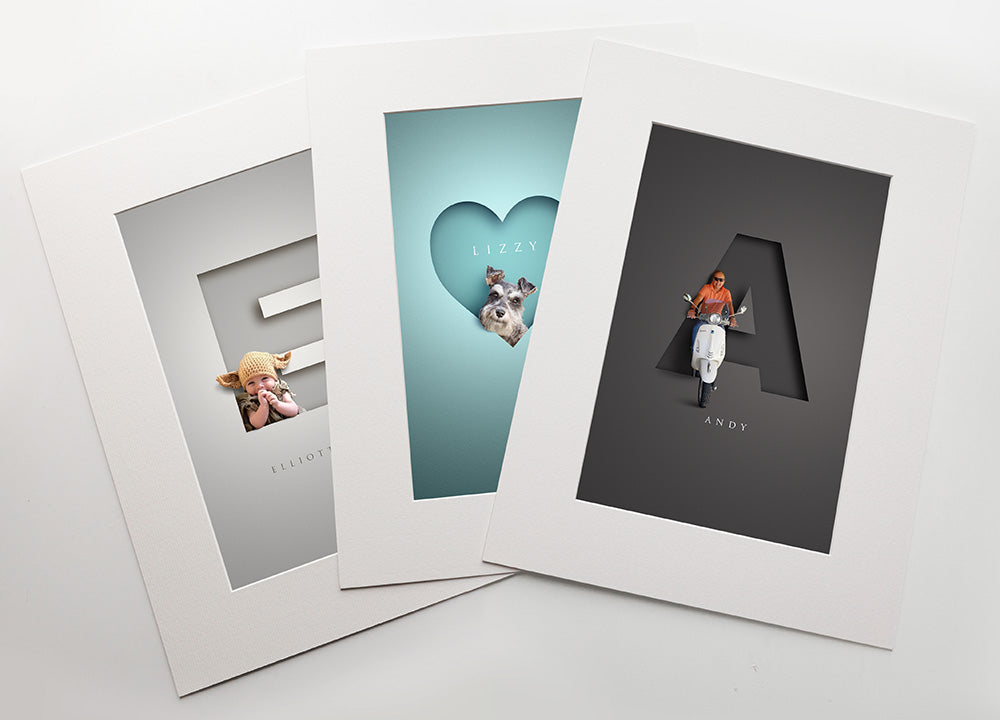 three premuim quality prints inside white photo mounts. cute baby in a knitted hat, a schnauzer dog inside a heart shape and a man on a scooter coming out of the letter A