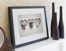Load image into Gallery viewer, Modern dog picture in black wood frame. 3 dogs in 3 hearts in a realistic paper cut out style making it look 3d