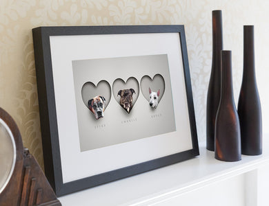 Modern dog picture in black wood frame. 3 dogs in 3 hearts in a realistic paper cut out style making it look 3d