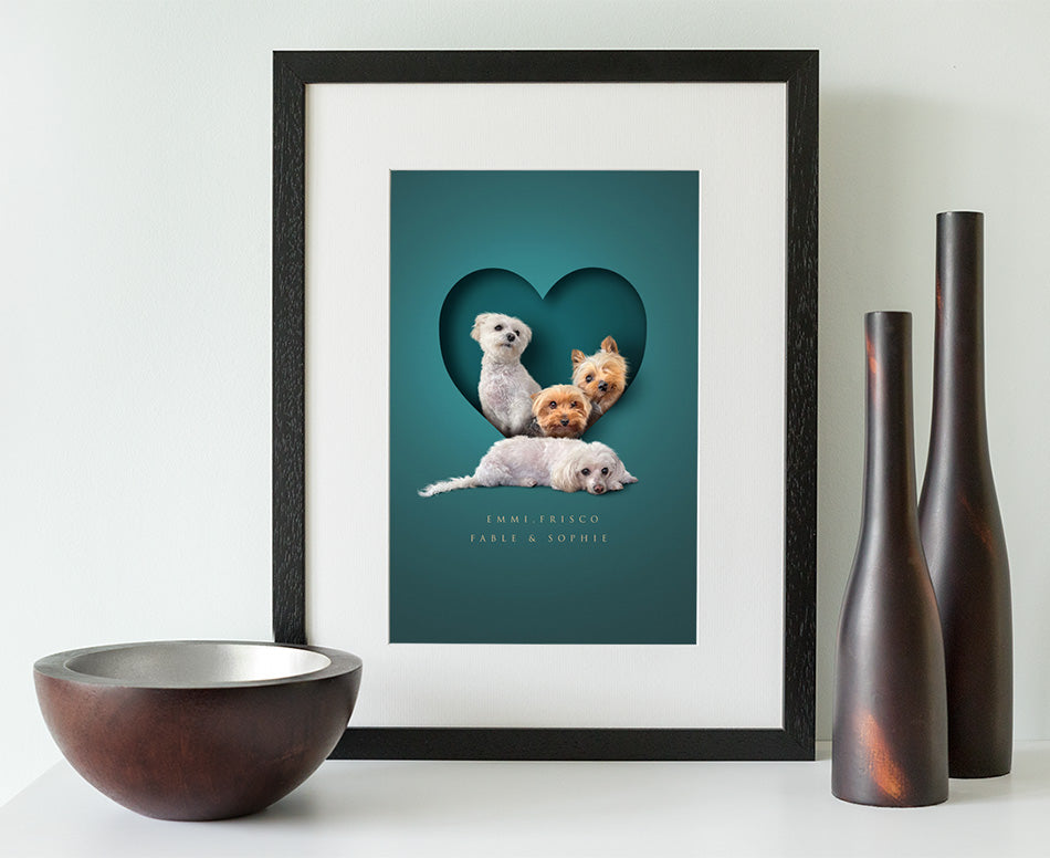 Modern and unique pet picture with dogs sitting in a heart shape cutout creating a stylish 3d effect. Black wood frame.