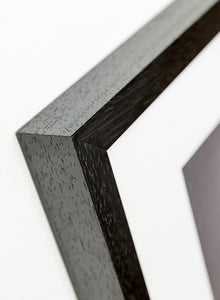 detail of black wooden picture frame