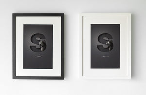 Add a white, black or Oak effect picture frame
