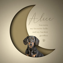 Load image into Gallery viewer, Unusual dog portrait. Close up of dachshund appearing to sit inside a crescent moon paper cutout. Gives a realistic 3d effect. Elegant type with a memorial message and cute paw print