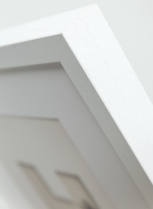 white wood picture frame corner detail