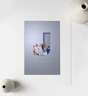 Unusual graphic design of family portrait photo added to a cut out letter effect that gives a 3D look and family name in an elegant typeface written underneath