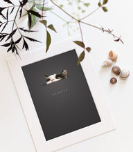 Load image into Gallery viewer, Cute cat picture of a black and white cat peeking out of a cut in a piece of paper design to create a 3d illusion.