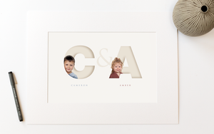 picture in photo mount of two children, each one sitting inside the initial letter of their name and their full name written below in a classy serif font