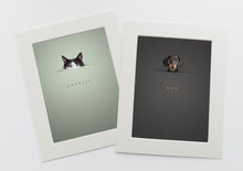 Load image into Gallery viewer, Unique cat and dog portraits 2 pictures in white photo mounts of pets peeking above a horizon line and their names are written below in a serif font